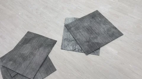 Square carpets on floor. New office room interior white furniture assembly Stock Footage 246846232