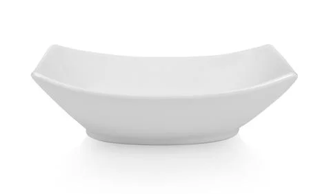 Square ceramic plate on white background. Stock Photos