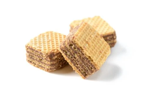 Square chocolate wafer biscuits isolated on white background, bakery and snac Stock Photos