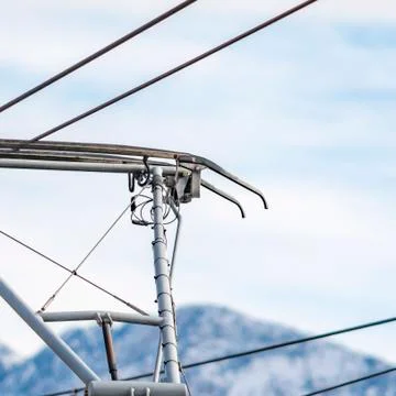 Square Close up of the metal structure that connects a train to the cable wire Foto stock