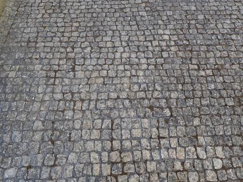 Square cobblestone road or path or bricks on ground Stock Photos