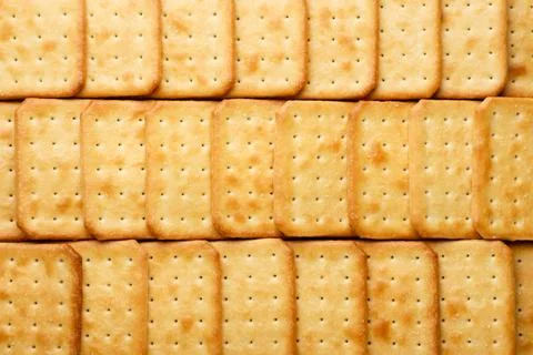Square crackers background. Top view Stock Photos
