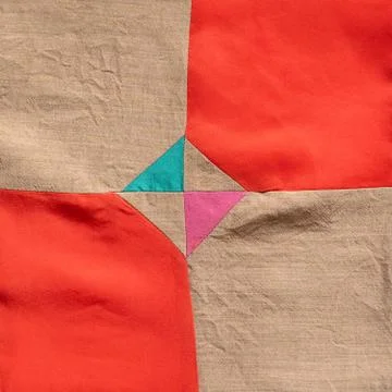Square detail of hand-stitched patchwork cloth Stock Photos