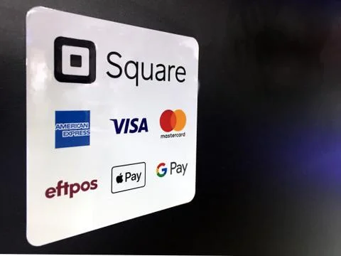 Square device sticker in a retail store Stock Photos
