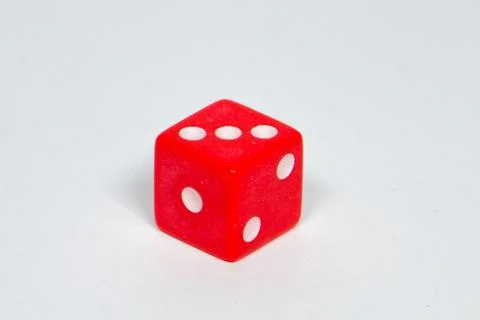 Square dice in red on a white background Stock Photos