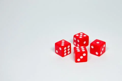 Square dice in red on a white background Stock Photos