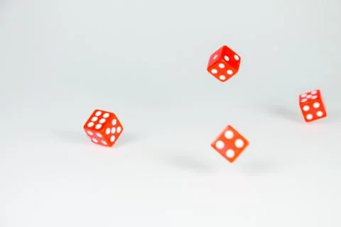 Square dice in red on a white background Stock Photos