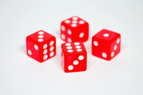 Square dice in red on a white background Stock Photos