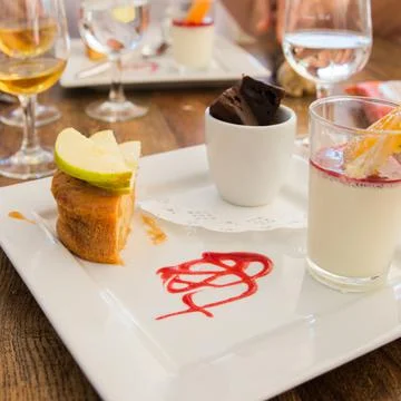 Square dish with assorted small desserts Stock Photos