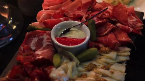 Square dish with sliced meat and sauce mixture in restaurant Stock-Footage 192970653