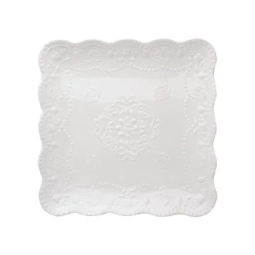 Square empty ceramic plate isolated on white. View top Stock-Fotos