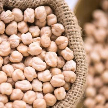 Square format of chickpeas with hessian sack Stock Photos