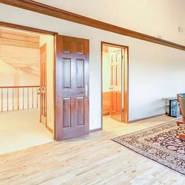 Square frame Bright, open and warm bonus room upstairs with vaulted ceilings Stock Photos