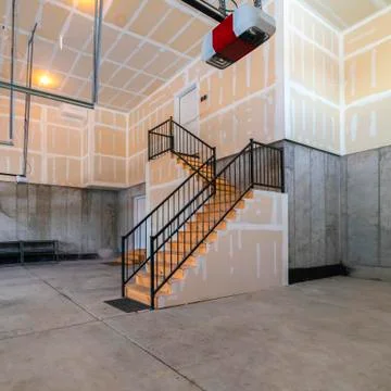 Square frame Empty open plan basement in a modern house Stock Photos