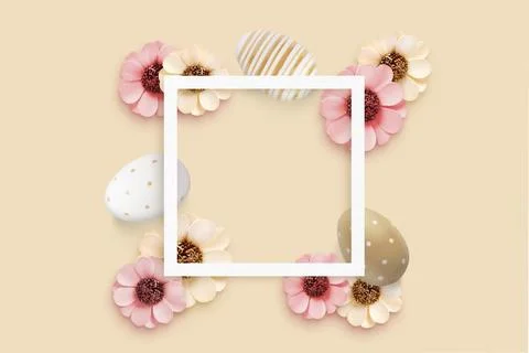 Square frame surrounded by Easter eggs and flower decorations. Copy space for Stock Photos