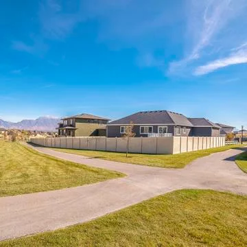 Square frame Two intersecting paved pedestrian walkways during day Stock Photos