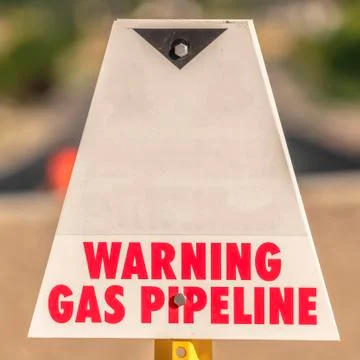 Square frame Utility warning sign used to identify and mark underground gas Stock Photos