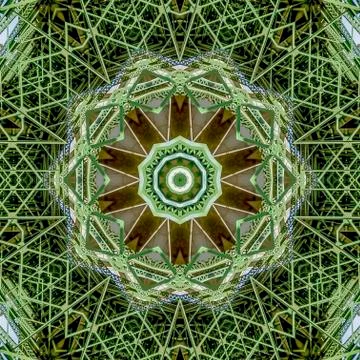 Square frame Very busy patterned photo created from the shapes of a green bridge Stock Photos