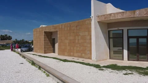 Square in front of Castello Maniace in sunlight Stock Footage 310509328