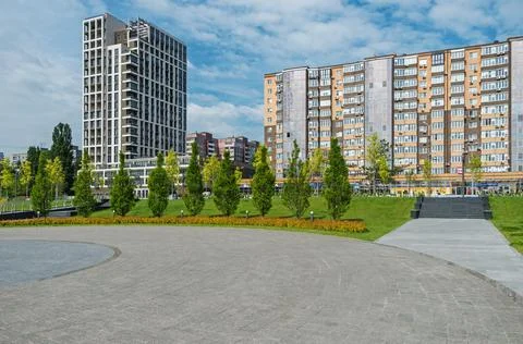 Square in front of multi-storey residential complex Stock Photos