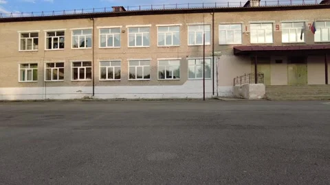 On the square in front of the old school in Russia 動画素材 159664023