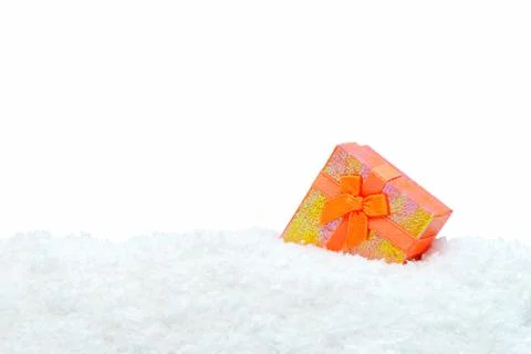Square gift box in snow Stock Photos