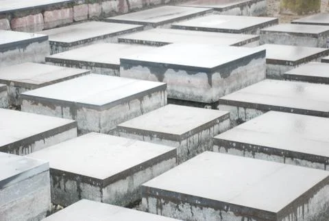 Square grey stone blocks under the rain Stock Photos