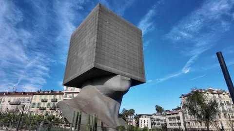 Square Head Library - Contemporary Sculpture in Urban Setting Stock Footage 329588059