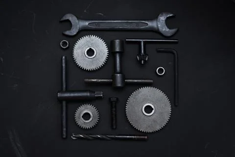 Square layout of different tools on dark background. Stock Photos