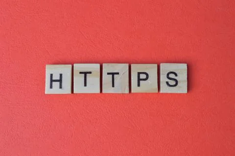 Square letters with text HTTPS isolated on a red background Foto stock