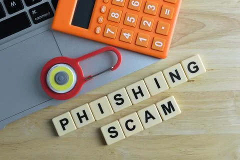 Square letters with text PHISHING SCAM. Top view. Stock Photos