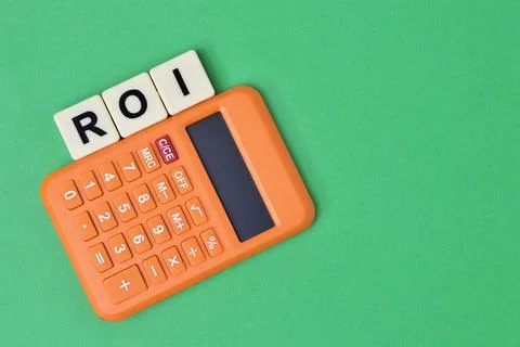 Square letters with text ROI stands for RETURN ON INVESTMENT. Stock Photos
