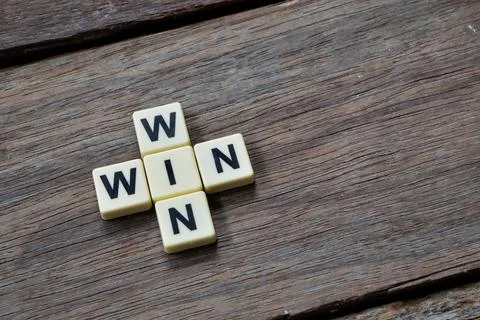 Square letters with text WIN WIN. Top angle view. Stock Photos