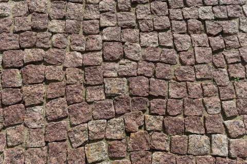 Square lined with cobblestone or stone pavement, walkway or road. Foto stock