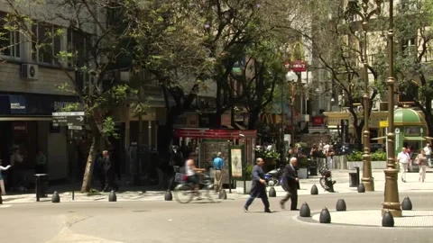 Square near a roundabout with traffic in Buenos Aires city center Stock Footage 160280649