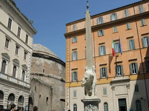 Square with obelisk and view of the pantheon with flags Stock Footage 74470093