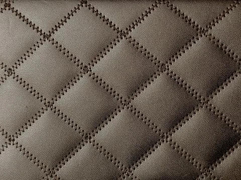 Square or box pattern on beige bag. Stock Photos
