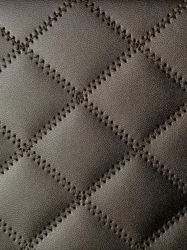 Square or box pattern on beige bag. Stock Photos