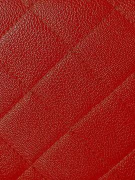 Square or box pattern on orange bag. Stock Photos