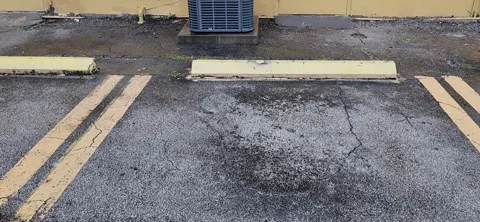Square outdoor air conditioning unit in backyard of office and shopping cente Stock Footage 327067277