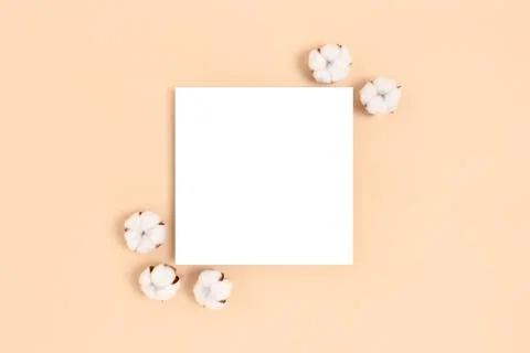 Square paper card mockup with frame made of cotton. Stock Photos