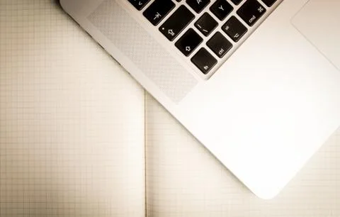 Square paper notebook with computer on it Foto stock