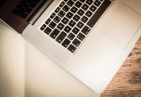 Square paper notebook with computer on it Foto stock