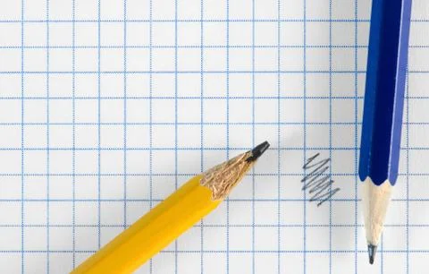 Square paper witd doodle and two color pencils. Foto stock