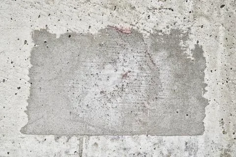 A square patch of concrete with old grunge effect. Place for text. Stock Photos