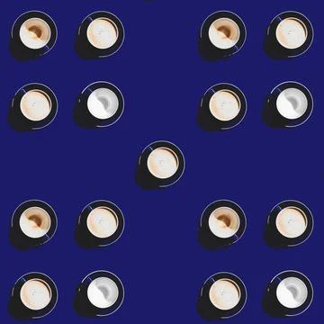 A square pattern of blue cups on a blue background. Coffee break. Stock Photos