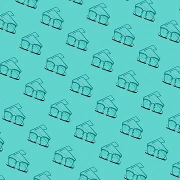 Square pattern of glasses for vision with shadow on blue background. Fashionable Stock Photos