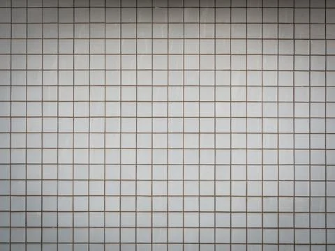 Square patterned brick wall Stock Photos