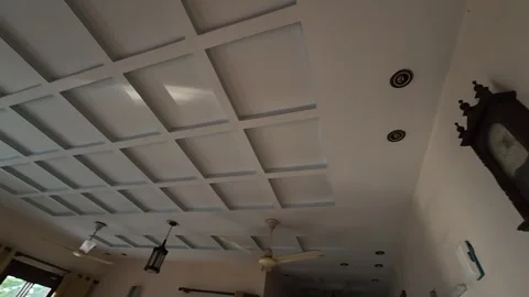 Square-patterned ceiling design that enhances the interior aesthetic. Stock Footage 280912149