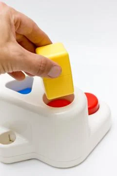 Square peg round hole Stock Photos